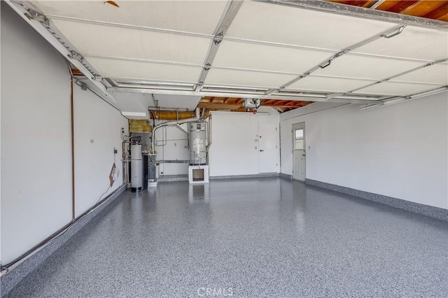 14632 Kimberly Cir, Tustin, CA 92780 - garage featuring strapped water heater and a garage door opener