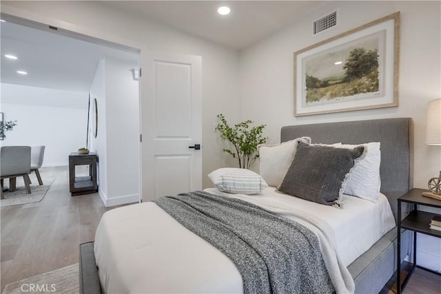 14632 Kimberly Cir, Tustin, CA 92780 - bedroom with wood finished floors and recessed lighting