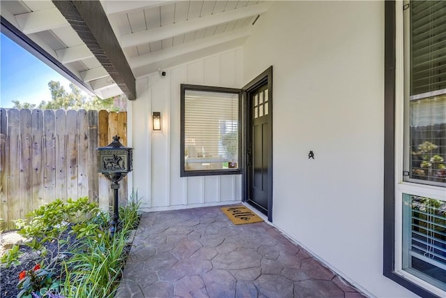 14632 Kimberly Cir, Tustin, CA 92780 - entrance to property featuring board and batten siding, a patio, and a security system