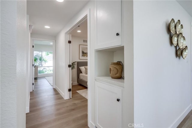 14632 Kimberly Cir, Tustin, CA 92780 - hall featuring light wood-style flooring and recessed lighting