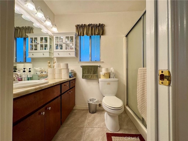 512 E Clinton Ave, Atwater, CA 95301 - full bath with tile patterned floors, vanity, and a stall shower