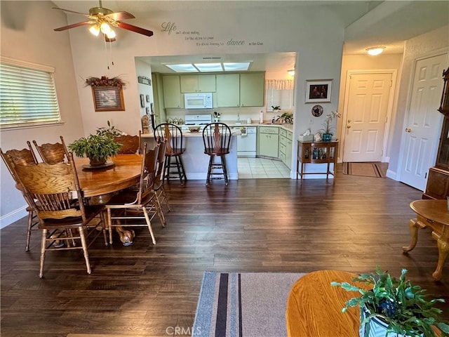 512 E Clinton Ave, Atwater, CA 95301 - dining area featuring dark wood-style flooring and ceiling fan