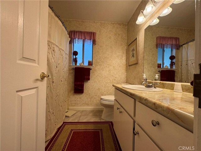 512 E Clinton Ave, Atwater, CA 95301 - full bathroom with vanity and tile patterned flooring