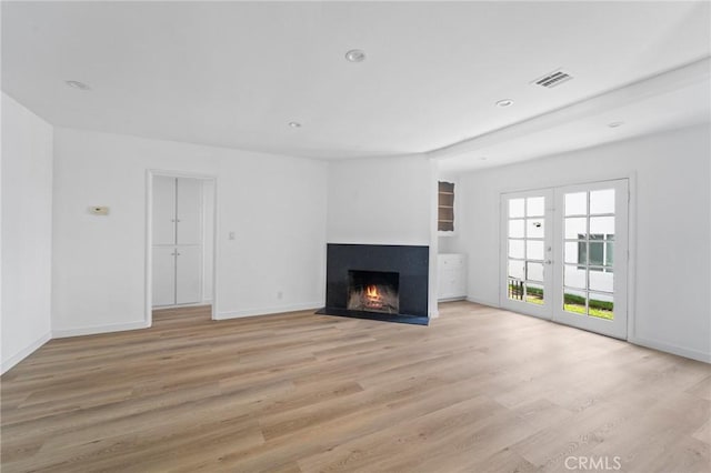 18656 Runnymede St, Reseda, CA 91335 - unfurnished living room featuring light wood finished floors, a fireplace with flush hearth, and recessed lighting
