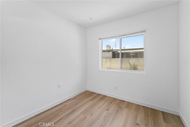18656 Runnymede St, Reseda, CA 91335 - unfurnished room with light wood-style floors and baseboards