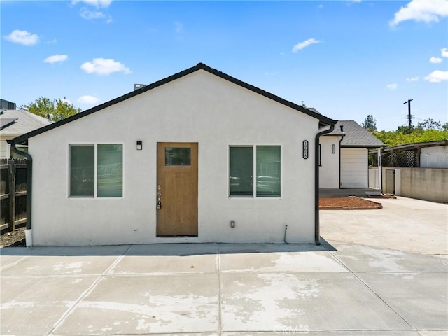 18656 Runnymede St, Reseda, CA 91335 - back of house featuring a patio and stucco siding