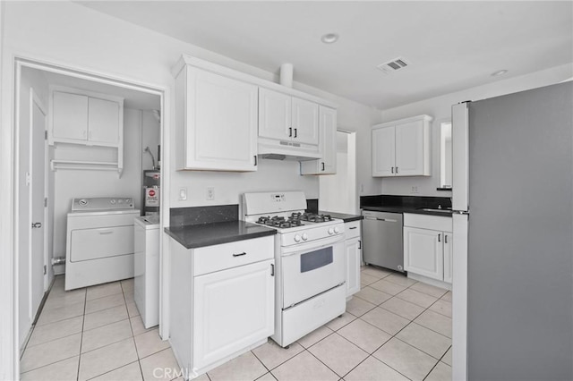 18656 Runnymede St, Reseda, CA 91335 - kitchen featuring freestanding refrigerator, white gas stove, washer / clothes dryer, dishwasher, and under cabinet range hood