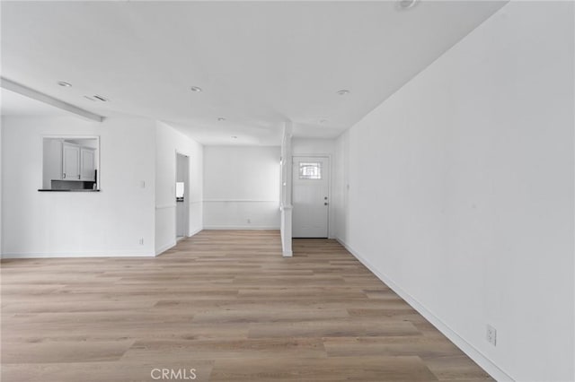 18656 Runnymede St, Reseda, CA 91335 - unfurnished room featuring baseboards and light wood-style flooring