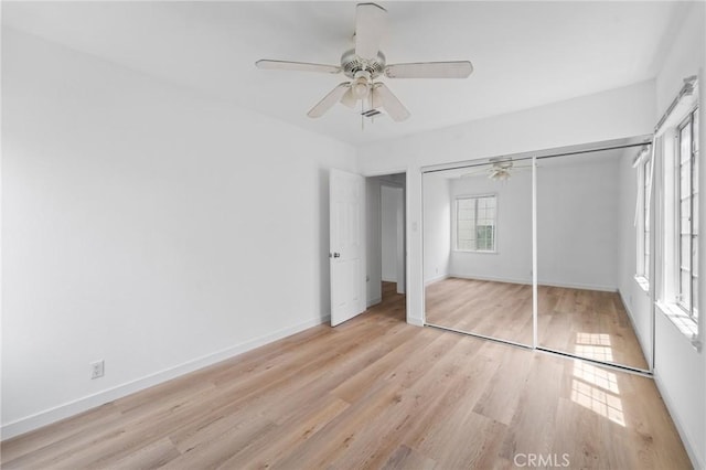 18656 Runnymede St, Reseda, CA 91335 - unfurnished bedroom with light wood finished floors, a closet, and ceiling fan