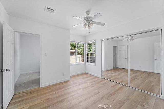 18656 Runnymede St, Reseda, CA 91335 - unfurnished bedroom featuring light wood finished floors, a ceiling fan, and a closet