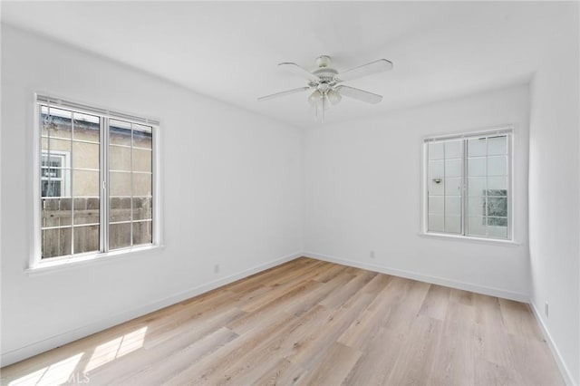 18656 Runnymede St, Reseda, CA 91335 - spare room featuring healthy amount of natural light, light wood-type flooring, and a ceiling fan