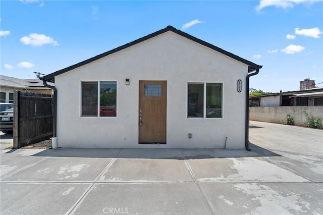 18656 Runnymede St, Reseda, CA 91335 - back of property with stucco siding and a patio