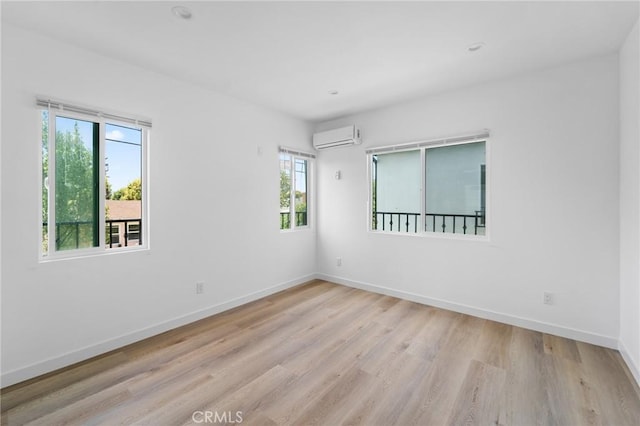 18656 Runnymede St, Reseda, CA 91335 - empty room featuring wood finished floors and an AC wall unit