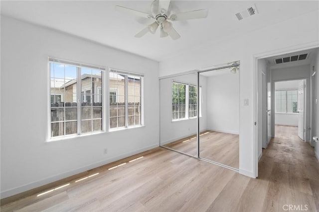 18656 Runnymede St, Reseda, CA 91335 - unfurnished bedroom featuring light wood finished floors, a closet, and a ceiling fan