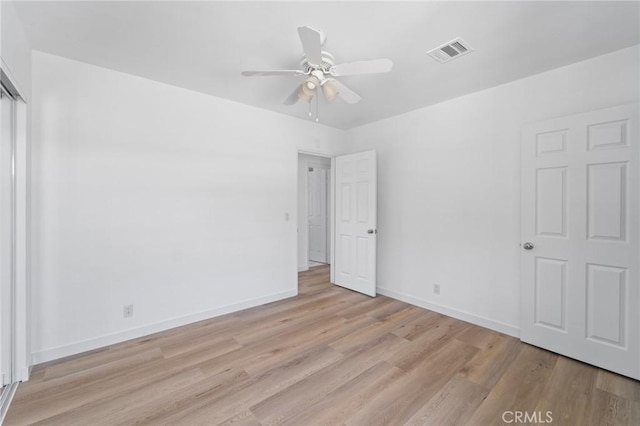 18656 Runnymede St, Reseda, CA 91335 - unfurnished bedroom with light wood-type flooring, ceiling fan, and a closet