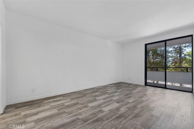13331 Moorpark St Unit 206, Sherman Oaks, CA 91423 - unfurnished room with wood finished floors and baseboards