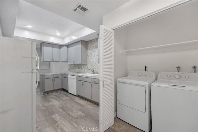 13331 Moorpark St Unit 206, Sherman Oaks, CA 91423 - laundry area with washer and clothes dryer and recessed lighting