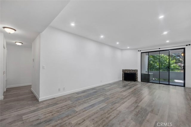 13331 Moorpark St Unit 206, Sherman Oaks, CA 91423 - unfurnished living room featuring wood finished floors and recessed lighting