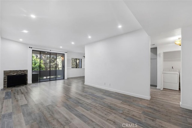 13331 Moorpark St Unit 206, Sherman Oaks, CA 91423 - unfurnished living room with washer / dryer, wood finished floors, and recessed lighting