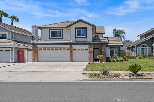 3681 Foxplain Rd, Corona, CA 92882 - traditional-style home with an attached garage, driveway, brick siding, a front yard, and a tiled roof