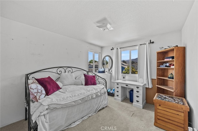 3681 Foxplain Rd, Corona, CA 92882 - bedroom featuring light carpet and a textured ceiling