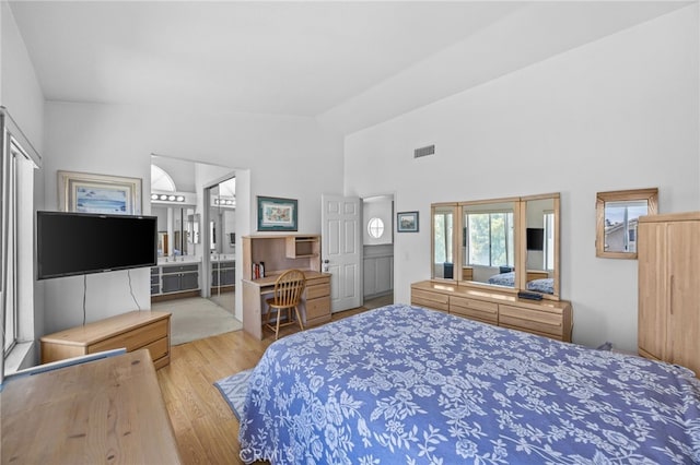 3681 Foxplain Rd, Corona, CA 92882 - bedroom featuring wood finished floors, high vaulted ceiling, and ensuite bath