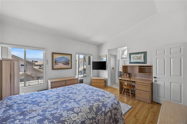 3681 Foxplain Rd, Corona, CA 92882 - bedroom with vaulted ceiling, multiple windows, light wood finished floors, access to outside, and a desk