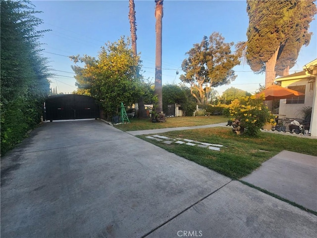 12138 Magnolia St, El Monte, CA 91732 - view of grassy yard featuring a gate