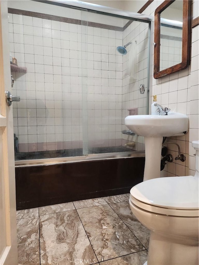 12138 Magnolia St, El Monte, CA 91732 - bathroom featuring  shower combination and tile walls