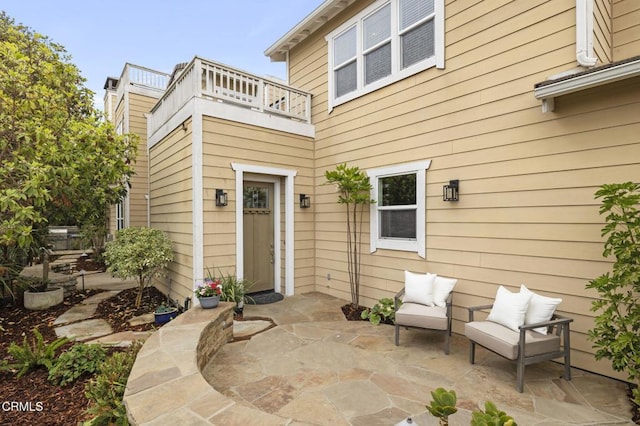 5000 Terramar Way, Oxnard, CA 93035 - view of exterior entry featuring a balcony and a patio