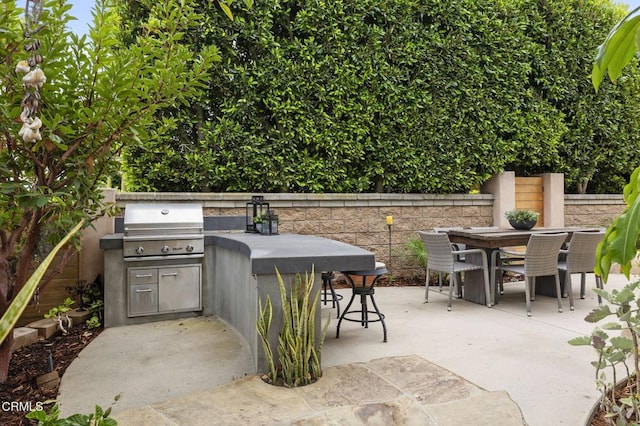 5000 Terramar Way, Oxnard, CA 93035 - view of patio / terrace with an outdoor kitchen and outdoor dining area