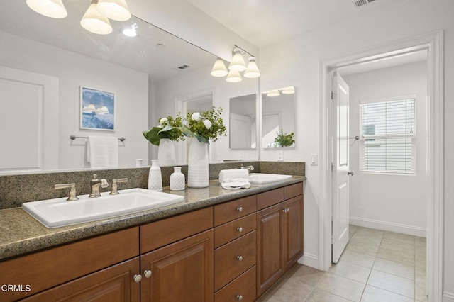 5000 Terramar Way, Oxnard, CA 93035 - full bathroom featuring double vanity, tile patterned floors, and a chandelier
