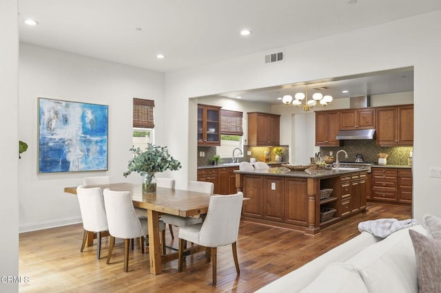 5000 Terramar Way, Oxnard, CA 93035 - dining space with a chandelier, dark wood-type flooring, and recessed lighting