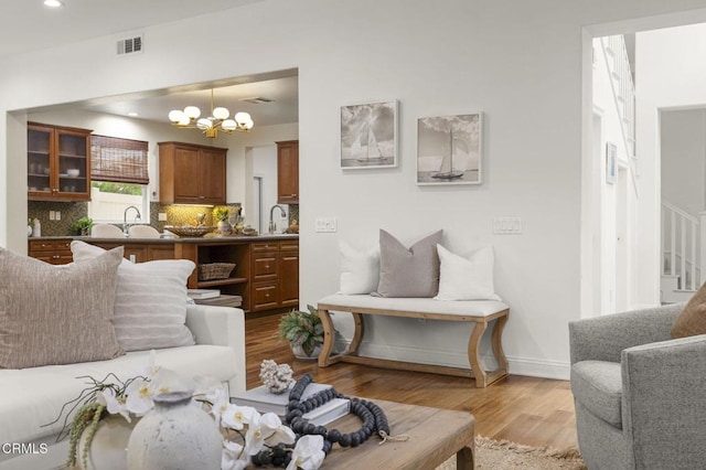 5000 Terramar Way, Oxnard, CA 93035 - living room featuring a chandelier, light wood-style flooring, and recessed lighting