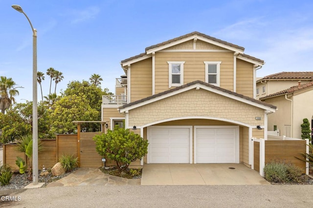 5000 Terramar Way, Oxnard, CA 93035 - view of front of property featuring a garage, a balcony, and concrete driveway