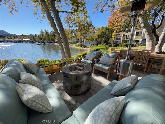 1158 S Westlake Blvd Unit D, Westlake Village, CA 91361 - wooden terrace with an outdoor living space with a fire pit and a water view