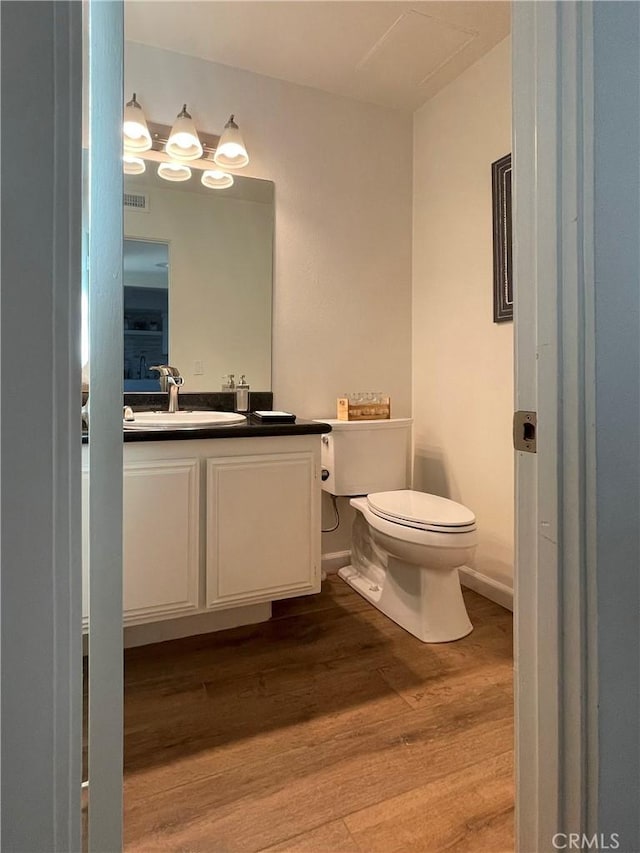 1158 S Westlake Blvd Unit D, Westlake Village, CA 91361 - half bathroom featuring wood finished floors and vanity