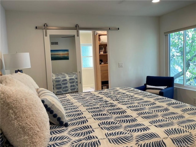 1158 S Westlake Blvd Unit D, Westlake Village, CA 91361 - bedroom with multiple windows, recessed lighting, and a barn door