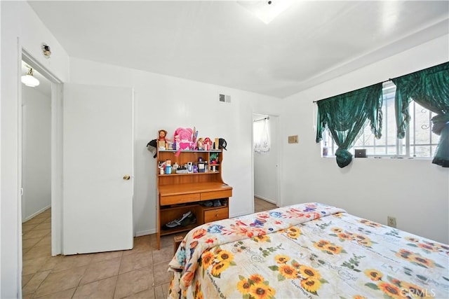 138 Banbridge Ave, La Puente, CA 91744 - bedroom with light tile patterned floors