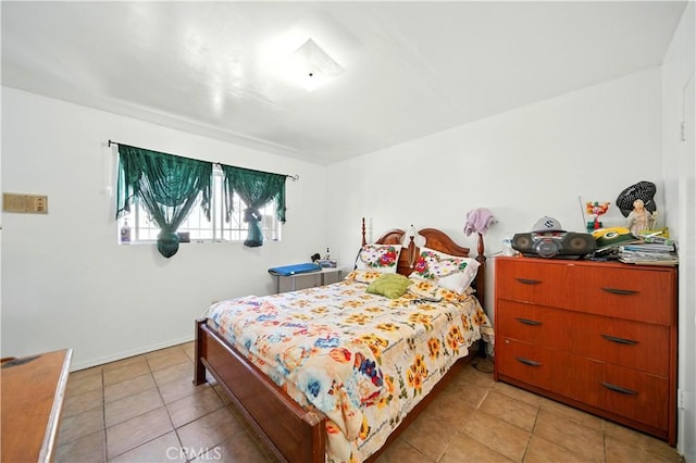 138 Banbridge Ave, La Puente, CA 91744 - bedroom with light tile patterned floors