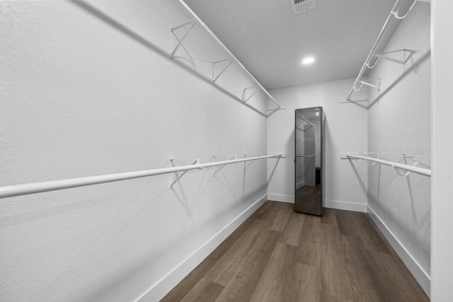 1026 Eucalyptus Ave, Vista, CA 92084 - spacious closet featuring wood finished floors