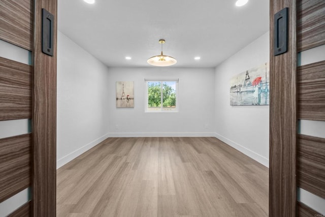 1026 Eucalyptus Ave, Vista, CA 92084 - unfurnished room with light wood-style flooring and recessed lighting