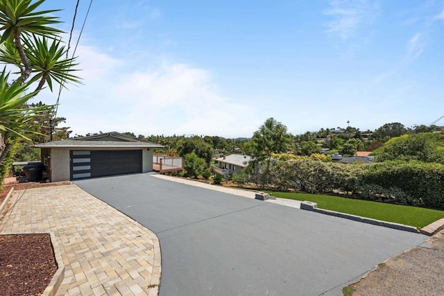 1026 Eucalyptus Ave, Vista, CA 92084 - view of front of home featuring a detached garage and a front yard