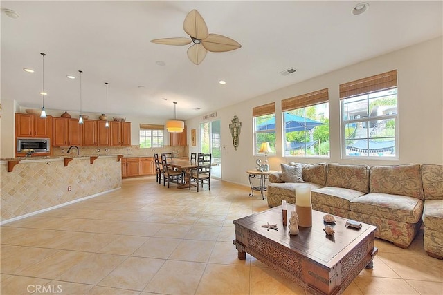 6236 Ashton Pl, Rancho Cucamonga, CA 91739 - living area featuring ceiling fan, light tile patterned flooring, and recessed lighting