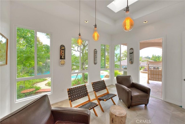 6236 Ashton Pl, Rancho Cucamonga, CA 91739 - sitting room with a skylight, plenty of natural light, light tile patterned floors, and recessed lighting