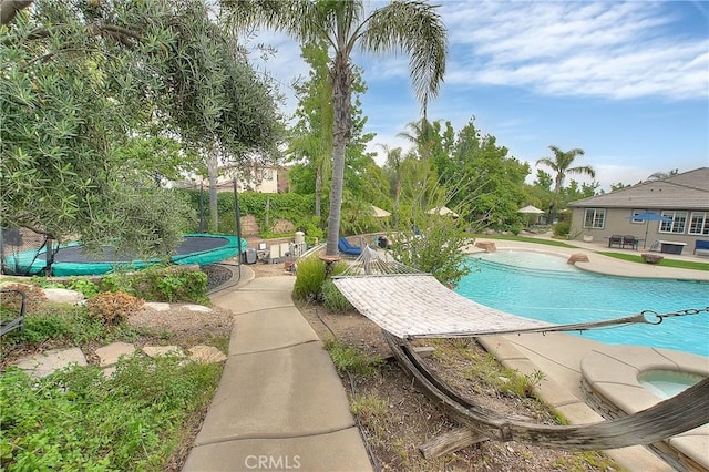 6236 Ashton Pl, Rancho Cucamonga, CA 91739 - view of swimming pool with a trampoline and a patio