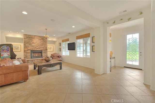 6236 Ashton Pl, Rancho Cucamonga, CA 91739 - living area featuring light tile patterned floors, plenty of natural light, recessed lighting, a chandelier, and a fireplace