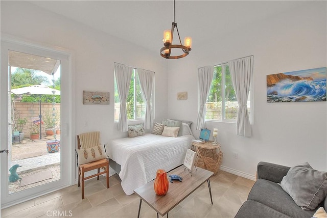 6236 Ashton Pl, Rancho Cucamonga, CA 91739 - bedroom with access to outside and a chandelier