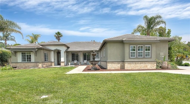 6236 Ashton Pl, Rancho Cucamonga, CA 91739 - view of front of home featuring stucco siding, a front lawn, and stone siding