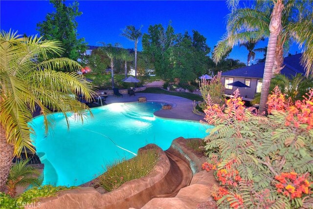 6236 Ashton Pl, Rancho Cucamonga, CA 91739 - pool at twilight with an outdoor pool and a patio area